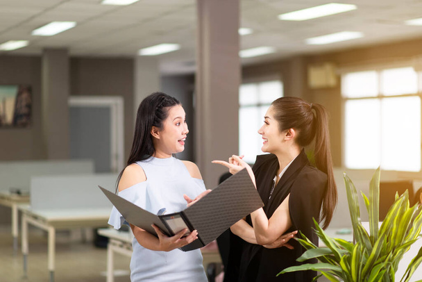 Beautiful asian businesswoman working in modern office together - Photo, Image