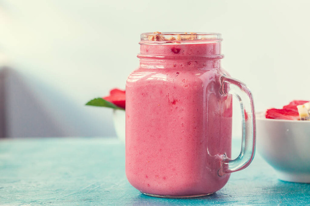 smoothie with granola for healthy breakfast. Selective focus - Photo, Image