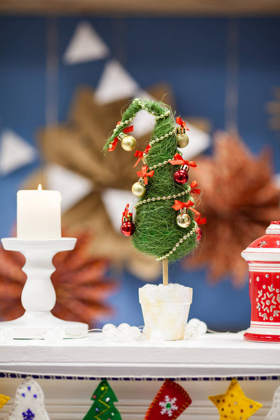 Small sisal Christmas tree, new year home decor. A Christmas gift - Foto, Imagen