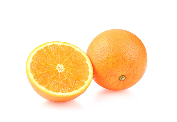 Orange fruit. Orange slice half and one segment isolated on white background. - 写真・画像