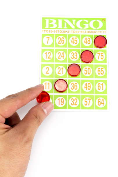 χέρι θέση της τελευταίας μάρκας να είναι νικητής του παιχνιδιού bingo - Φωτογραφία, εικόνα