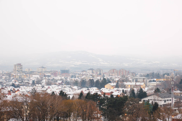 An aerial view of the city of Pirot in Serbia in winter - Fotó, kép