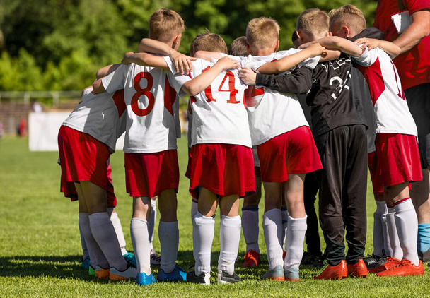 Children Team Sport. Kids Play Sports. Children Sports Team United Ready to Play Game. Football Coach With School Boys. Youth Sports For Children. Boys in Sports White and Red Uniforms. Young Boys in Soccer Sportswear - Photo, Image