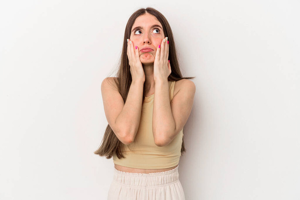 Young caucasian woman isolated on white background whining and crying disconsolately. - Photo, Image