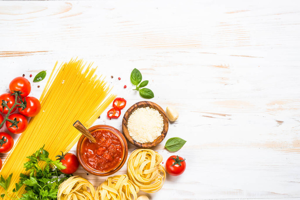 Italian food background at white bkitchen table. - Zdjęcie, obraz