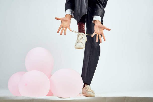 business man pink balloons office party light background - 写真・画像