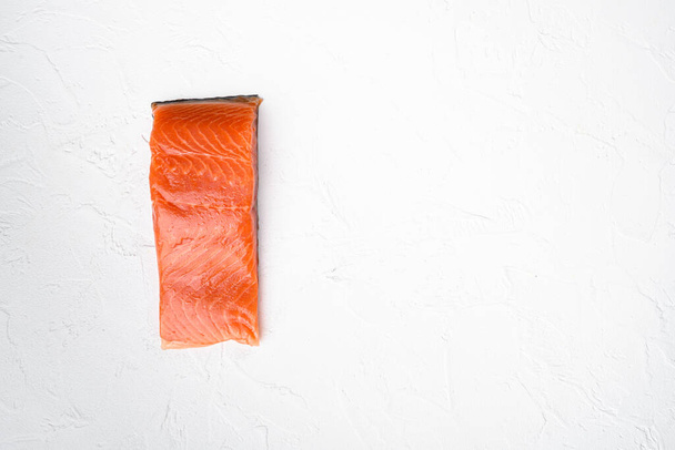 Fillet of salmon or trout set, on white stone table background, top view flat lay, with copy space for text - Foto, Imagen