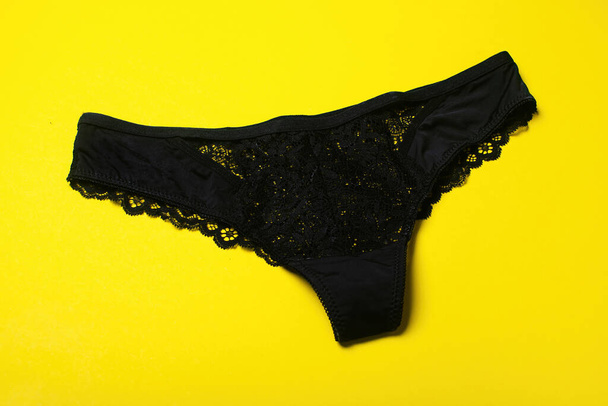 Beautiful black lace panties - thongs. Black lace lingerie. - Foto, afbeelding