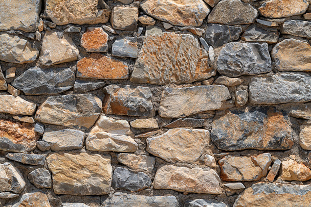 Close-up van stenen muur textuur. - Foto, afbeelding