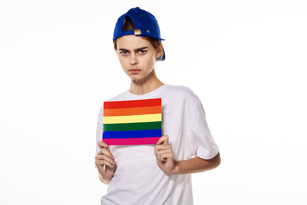 girl in white t-shirt Flag lgbt shemales posing light background - Фото, изображение