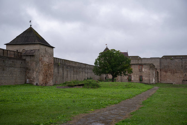 Courtyard of Ivangorod Fortress. View of the "Broad" tower and a large powder barn. Ivangorod, Russia - Photo, Image