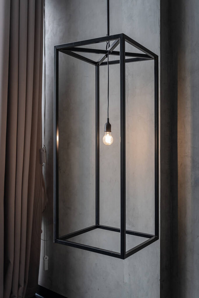 Vintage black square steel frame ceiling lamp light bulbs interior for a modern office building or home and living classic decoration. Concept retro or loft-style contemporary. - Zdjęcie, obraz