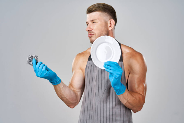 male athlete in aprons washing dishes service - Φωτογραφία, εικόνα