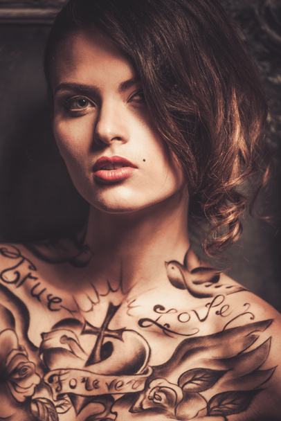 Beautiful woman with tattoos  - Foto, afbeelding