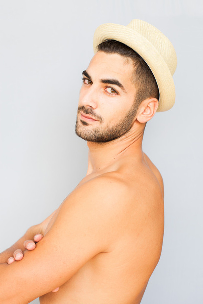 Handsome man half naked on white background - Fotografie, Obrázek
