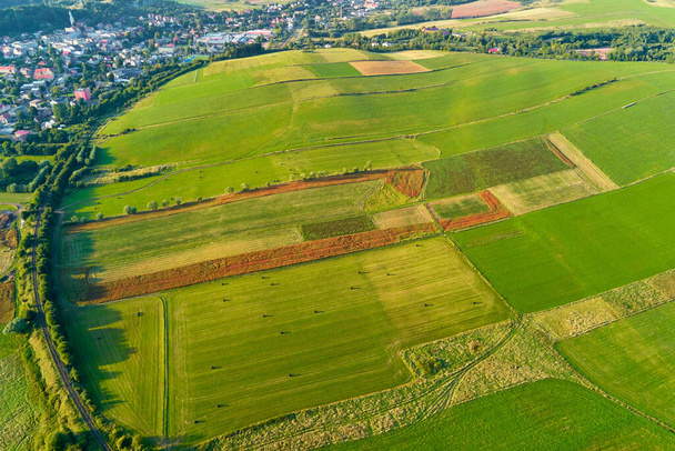 Aerial view of agricultural fields near small europe town. Countryside background. Nature landscape - Foto, Imagen