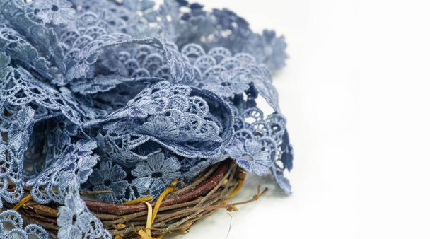 Gray-blue lace ribbon. wide floral pattern, colorful lace fabric, gift wrapping and flower decoratio - Valokuva, kuva