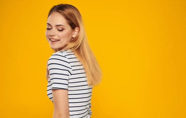 woman in striped t-shirt studio emotion posing model - Photo, Image