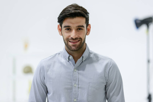 Portrait adult handsome attractive Caucasian beard businessman or model with short hair wearing clean shirt, looking camera, gently smiling with happiness and confidence, standing photography studio - Photo, Image