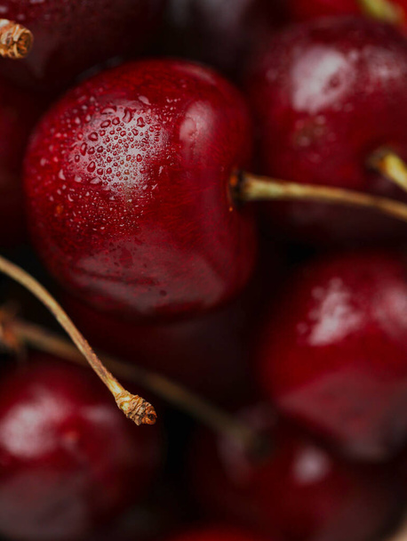 cherries on the board with water drops - Photo, image