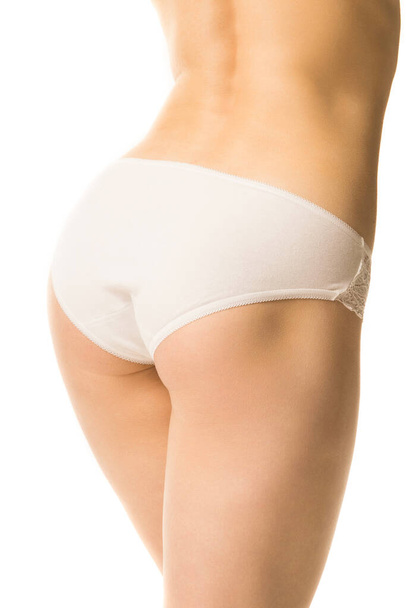 fit girl in panties on a white background, half-length shot - Photo, Image