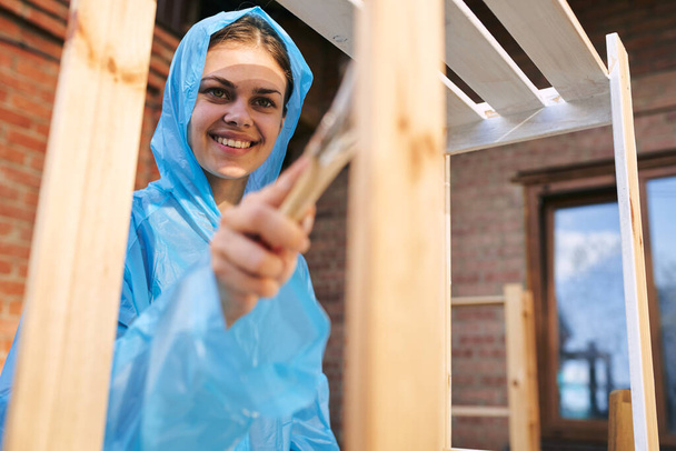 woman painter painting wood home renovation texture - Fotoğraf, Görsel
