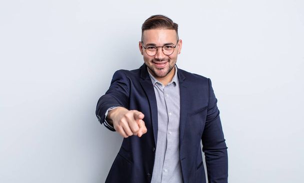young handsome man pointing at camera choosing you. businessman concept - Fotografie, Obrázek