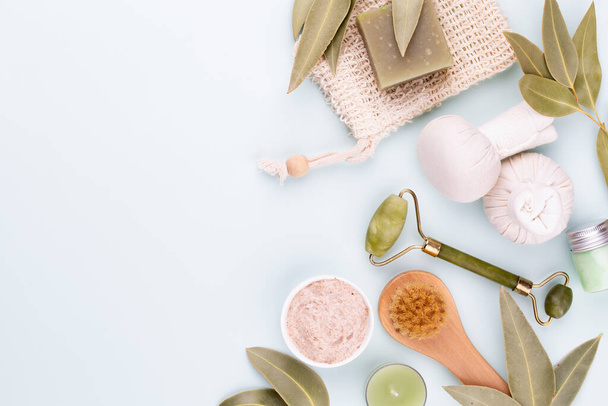 Spa and skin carehomemade cosmetics. Bottles with spa cosmetic products on pastel background. - 写真・画像