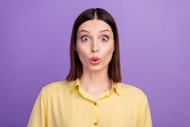 Photo of young woman astonished omg wow unexpected reaction fake novelty isolated over violet color background. - Photo, Image