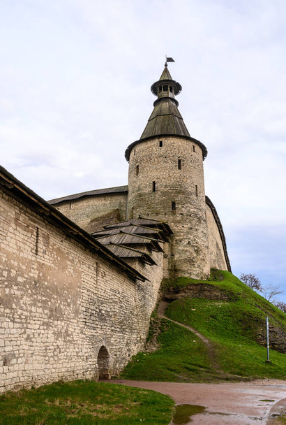 Square round tower. kremlin towers. Pskov, fortress wall. A beautiful evening. - Photo, Image
