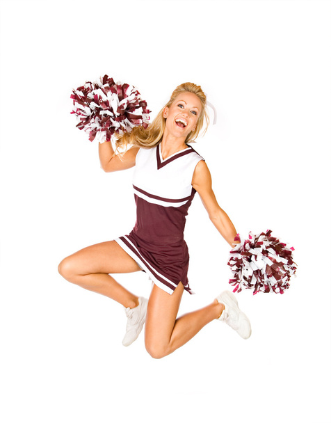 Football: Cheerleader Jumps Into Air - Foto, immagini