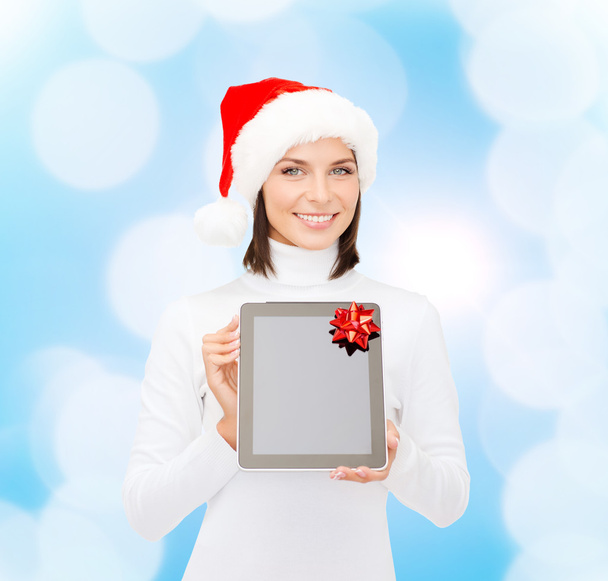 woman in santa helper hat with tablet pc - Photo, image