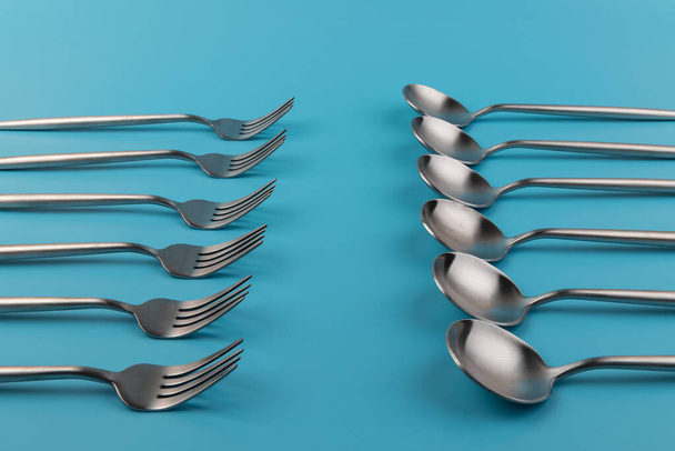 fork, knife, spoon, cutlery on blue background.  - Foto, Bild