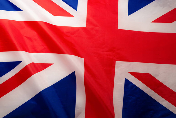 Grand drapeau britannique comme arrière-plan. Vue du dessus.  - Photo, image