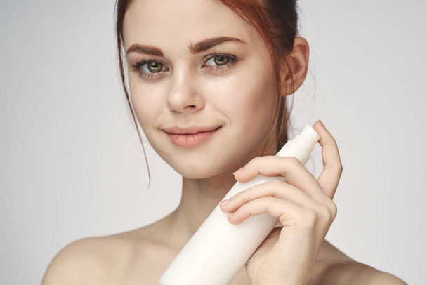 woman with lotion in hands clean skin care health close-up - Foto, Imagen