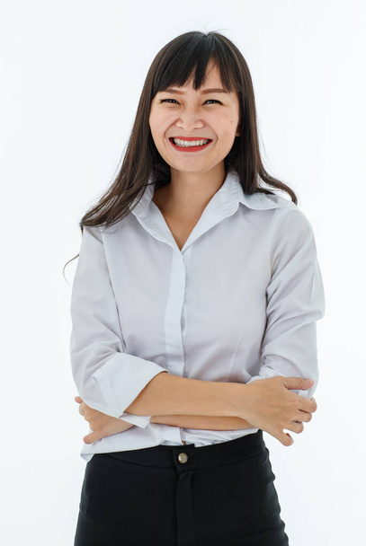 Asian lady long black hair wearing white shirt casual style arm crossed smiling standing look at camera white background. Smart modern employee woman looks - Photo, Image