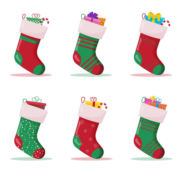 Set de calcetines navideños con regalos en el interior. Accesorios de invierno - Vector, Imagen
