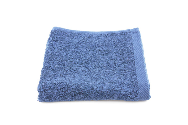 Blue towel on white background - Photo, Image