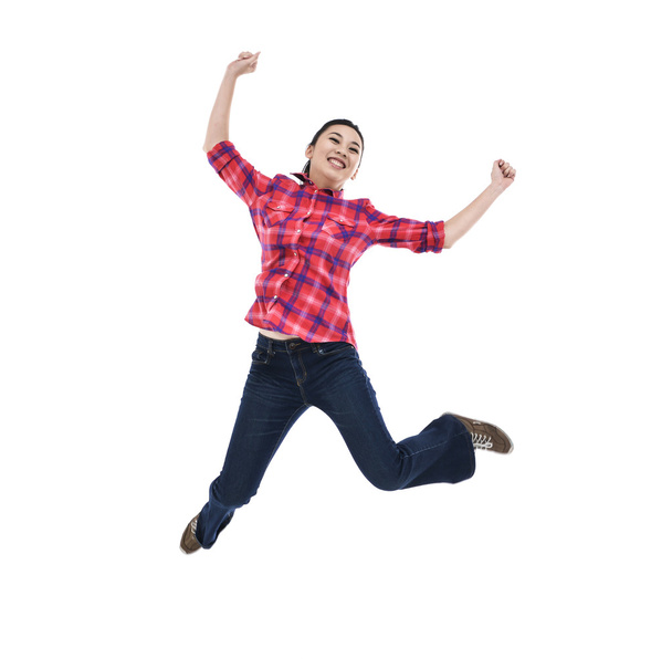 Young woman jumping - Фото, зображення