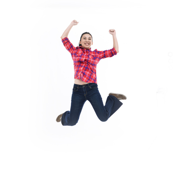 Nuori nainen hyppää - Valokuva, kuva