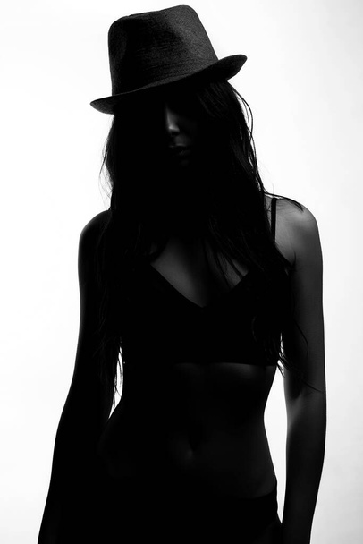 Young Sexy Woman in hat. Beautiful Girl in lingerie. Female silhouette - Foto, Imagem