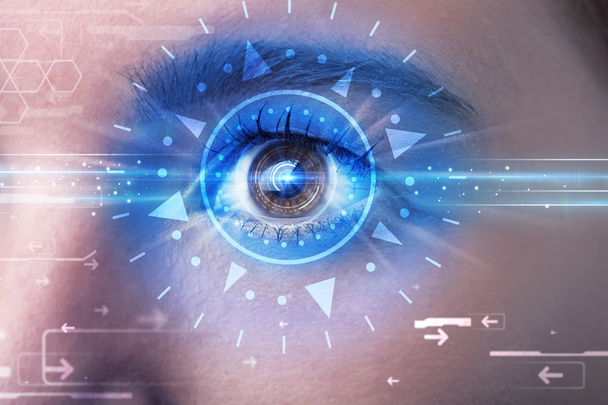 Cyber girl with technolgy eye looking into blue iris - Φωτογραφία, εικόνα