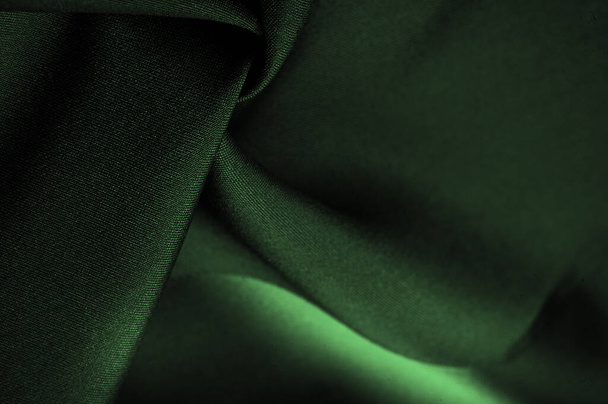 tessuto di seta smeraldo, questa è la tessitura di raso di seta. Differisce in densità, scorrevolezza e lucentezza del lato anteriore, morbidezza, Texture, sfondo - Foto, immagini