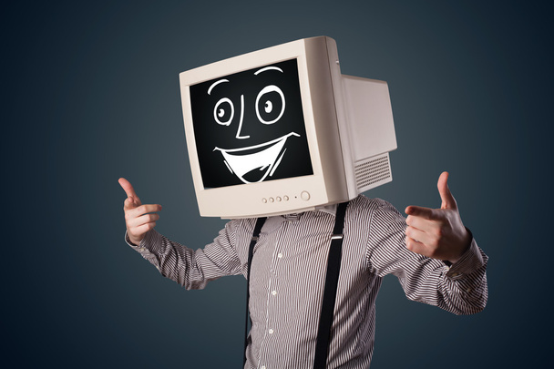 Happy businessman with a PC monitor head and a smiley face - Photo, Image