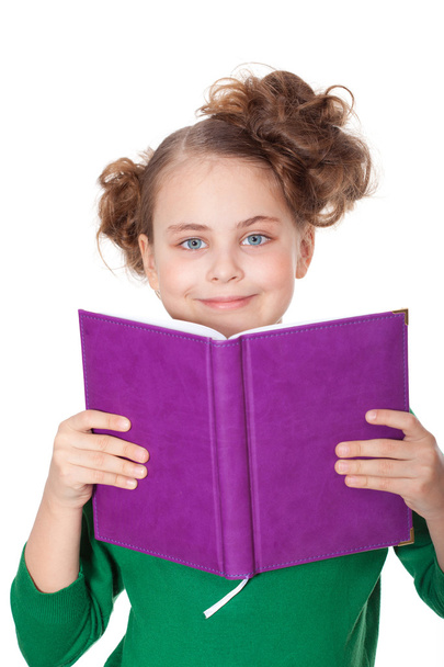 Smiling girl look behind book - Zdjęcie, obraz