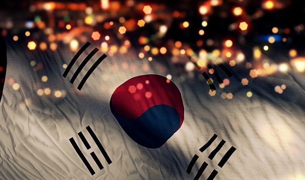 Südkorea Nationalflagge Licht Nacht Bokeh abstrakten Hintergrund - Foto, Bild