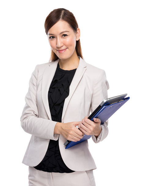 Businesswoman hold with clipboard and laptop computer - Photo, image