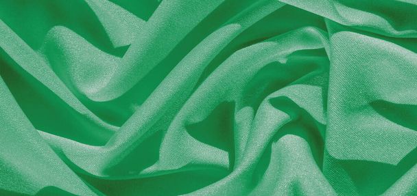 seda verde. Liso elegante tela de seda de lujo verde se puede utilizar como fondo abstracto con espacio de copia, de cerca. textura colorida - Foto, imagen