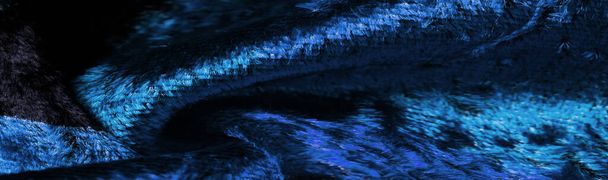 blaues Samtgewebe, dichtes Gewebe aus Seide, Baumwolle oder Nylon mit einem dicken kurzen Flor auf einer Seite. Struktur, Muster, Design - Foto, Bild