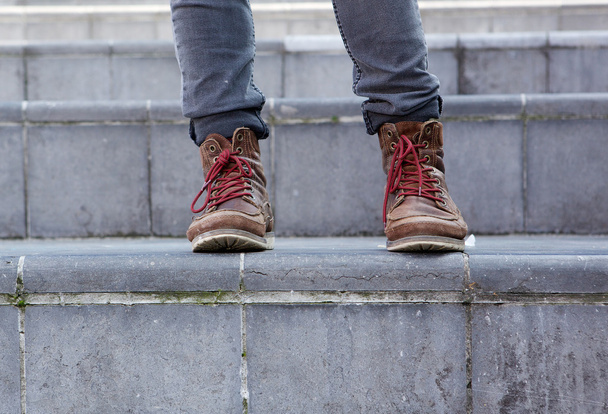 Male leather boots on steps - Photo, Image